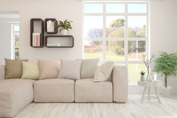 Stylish room in white color with sofa and autumn landscape in window. Scandinavian interior design. 3D illustration