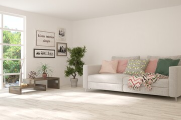 White living room with sofa and summer landscape in window. Scandinavian interior design. 3D illustration