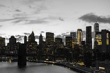Fotobehang New York Yellow lights in black and white skyline scene of Lower Manhattan buildings in New York City  © deberarr