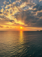 Beautiful sunset with a dramatic sky and clouds over the sea