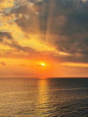 Beautiful sunset with a dramatic sky and clouds over the sea