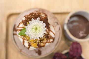 Bingsu or Asian Ice flake dessert with sweet milk cream whip