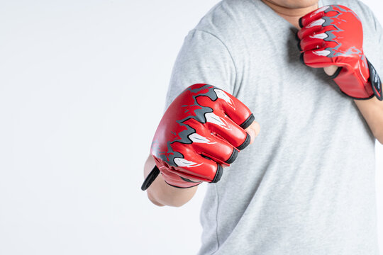 Hand Wearing Fighter Gloves With Finger Holes