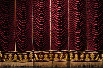 Closed theater curtain on stage in theater