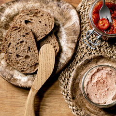 Glass jar of homemade chicken liver pate