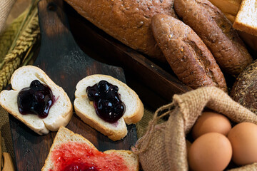 Various recipes and cooking equipment for dessert making placing together on wooden table by flat lay