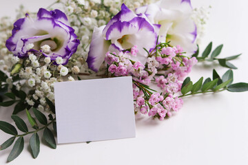 greeting card design. delicate bouquet of flowers on a white background 