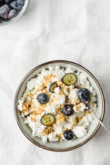 cottage cheese with blueberries on table