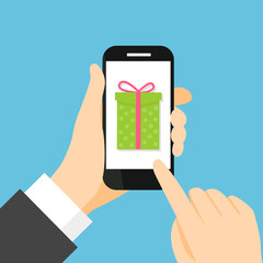 Online gift concept cartoon illustration. Hand holding a phone with gift box on screen cartoon vector illustration