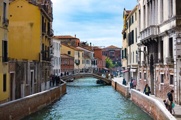 A bridge crossing a canal in Venice, Italy