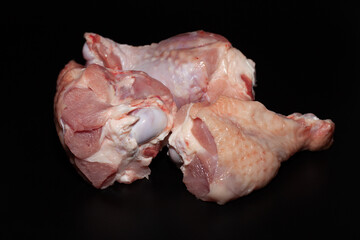 Turkey drumsticks with skin. Organic turkey meat with greens
