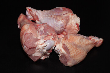 Turkey drumsticks with skin. Organic turkey meat with greens