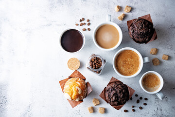 Cups of coffee on a white background