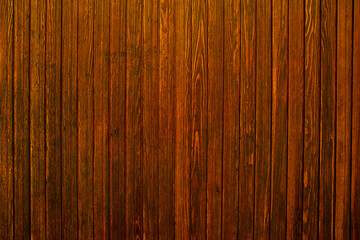 Vintage brown wood background texture with knots and nail holes.Vintage wooden dark horizontal boards.
