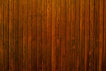 Vintage brown wood background texture with knots and nail holes.Vintage wooden dark horizontal boards.