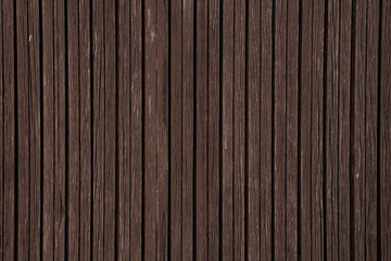 Vintage brown wood background texture with knots and nail holes.Vintage wooden dark horizontal boards.