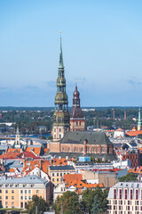 Obraz premium Riga panorama with St. Peter's Church, Lutheran church in Riga, the capital of Latvia and other churches and buildings, vertical