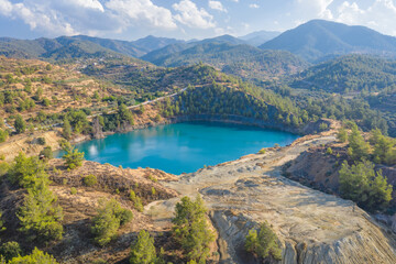 Naklejka na ściany i meble Memi mine lake, abandoned copper mine in Cyprus with the environment partially recovered and reforested