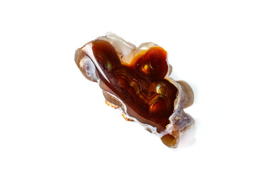 Macro mineral stone fiery Agate on a white background