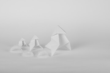 Origami of little birds and their feathers