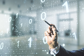 Double exposure of male hand with pen working with abstract virtual binary code hologram on blurred office background. Database and programming concept