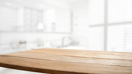 Table top and light kitchen room blurred background. With spacious windows.