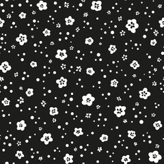 Fototapeta na wymiar Cute monochrome flowers with polka dots seamless repeat pattern. Random placed, doodled, vector millefleurs minimal all over print.