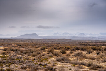 View of Chisos Mountains in Fog From Rio Grande