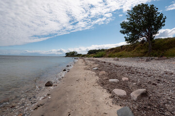 stony and more natural sandy beach on the Baltic Sea, island of Fehmarn,