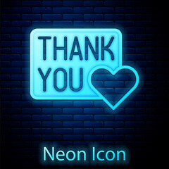 Glowing neon Thank you with heart icon isolated on brick wall background. Handwritten lettering. Vector