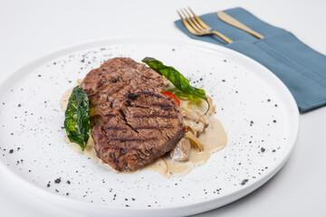 veal medallions, white mushroom sauce, basil