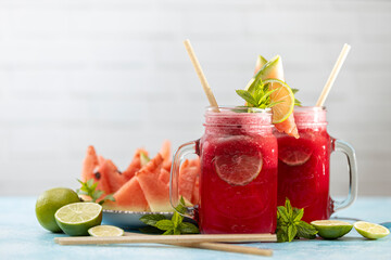 Watermelon mojito fresh red drink. With watermelon, lemon, lime, mint leaves and ice