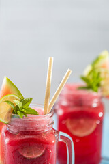 Watermelon mojito fresh red drink. With watermelon, lemon, lime, mint leaves and ice