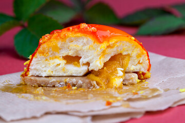 one orange cake with creamy white filling