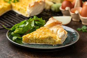 Homemade baked cheese and onion filo quiche or pie