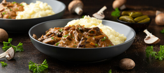 Beef Stroganoff with mushrooms and mashed potatoes.