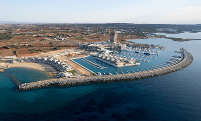 Aerial drone photo of ayia napa new marina and tourist yachts moored at the marina. Agia Napa harbor Cyprus