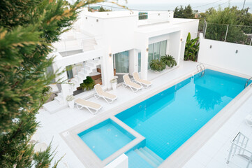 white villa with a swimming pool