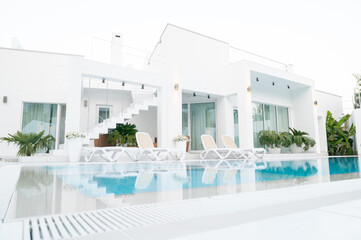 white villa with a pool