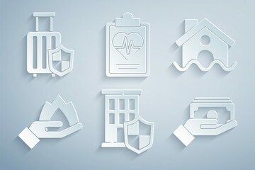 Set House with shield, flood, Hand holding a fire, Stacks paper money cash, Health insurance and Travel suitcase icon. Vector