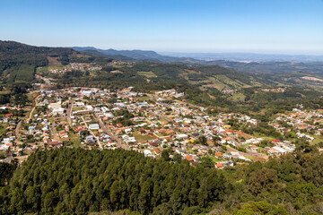 Village with houses and forest around