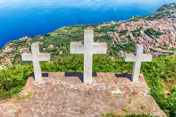 Three crosses on the top of Mount Sant'Elia, Palmi, Italy - obrazy, fototapety, plakaty