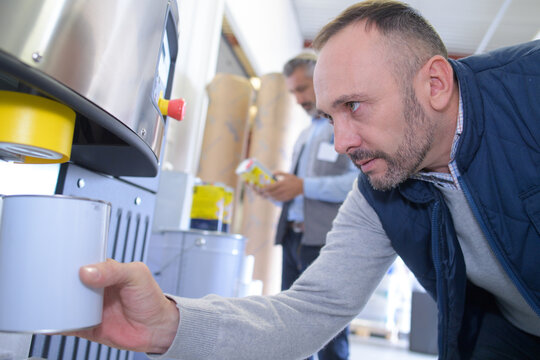 man using a vending machine