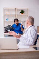 Two male doctors working in the clinic