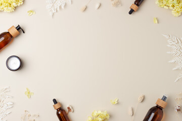 Cosmetic skin care products with flowers on pastel beige background. Flat lay, copy space