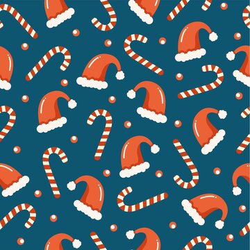 Seamless Christmas pattern with lollipops candy and santa Claus hats. Vector background for wrapping paper, fabric print, greeting cards design