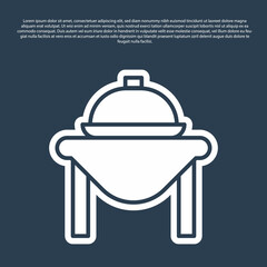 Blue line Table food icon isolated on blue background. Vector