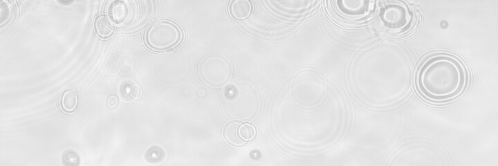 Water texture with circles on the water overlay effect for photo or mockup. Organic light gray drop shadow caustic effect with wave refraction of light. Long banner with empty space