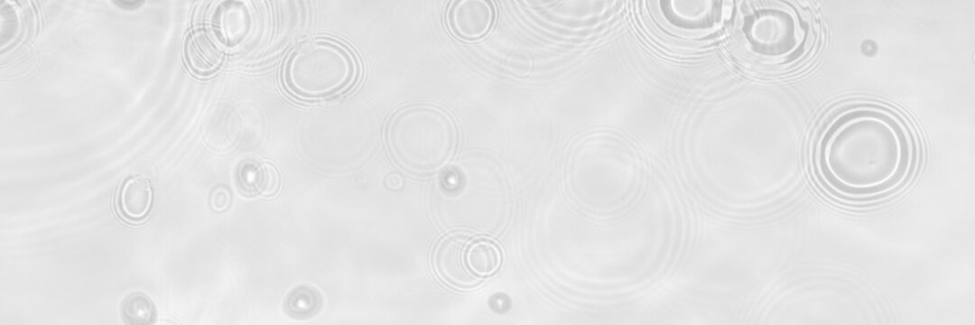 Water texture with circles on the water overlay effect for photo or mockup. Organic light gray drop shadow caustic effect with wave refraction of light. Long banner with empty space