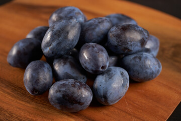 Blue plums in a collander